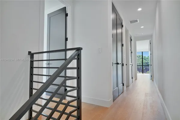 a view of entryway with stairs and a window