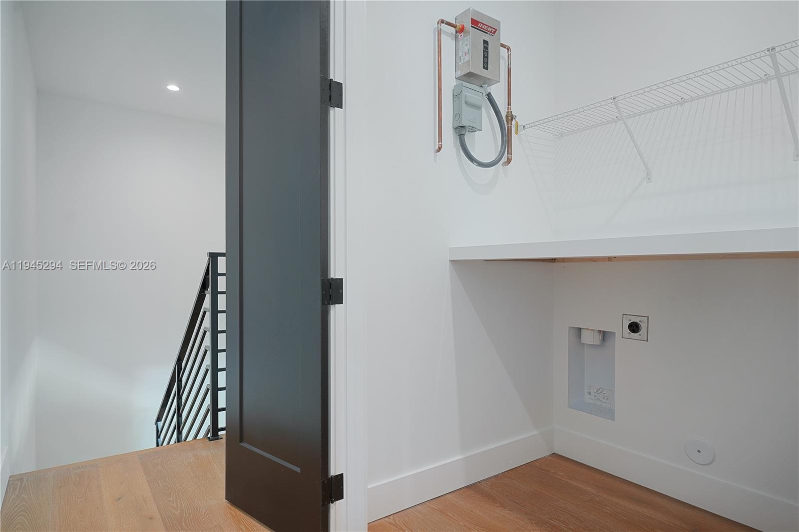 355 Northwest 50th Street Miami, FL 33127 - Photo 16 of 25 a view of an entryway with wooden floor