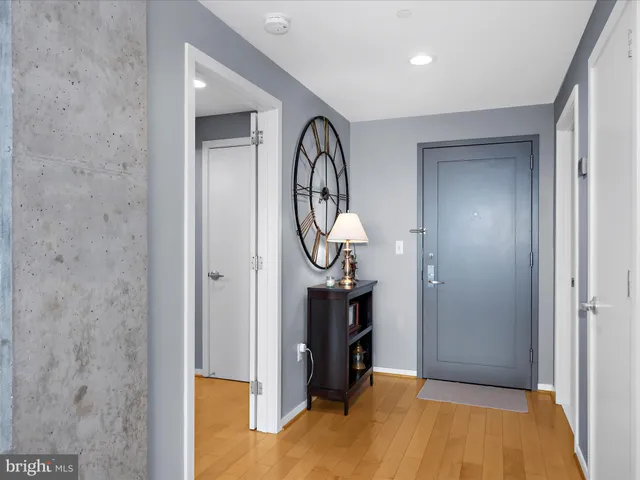 a view of a livingroom with furniture and a staircase