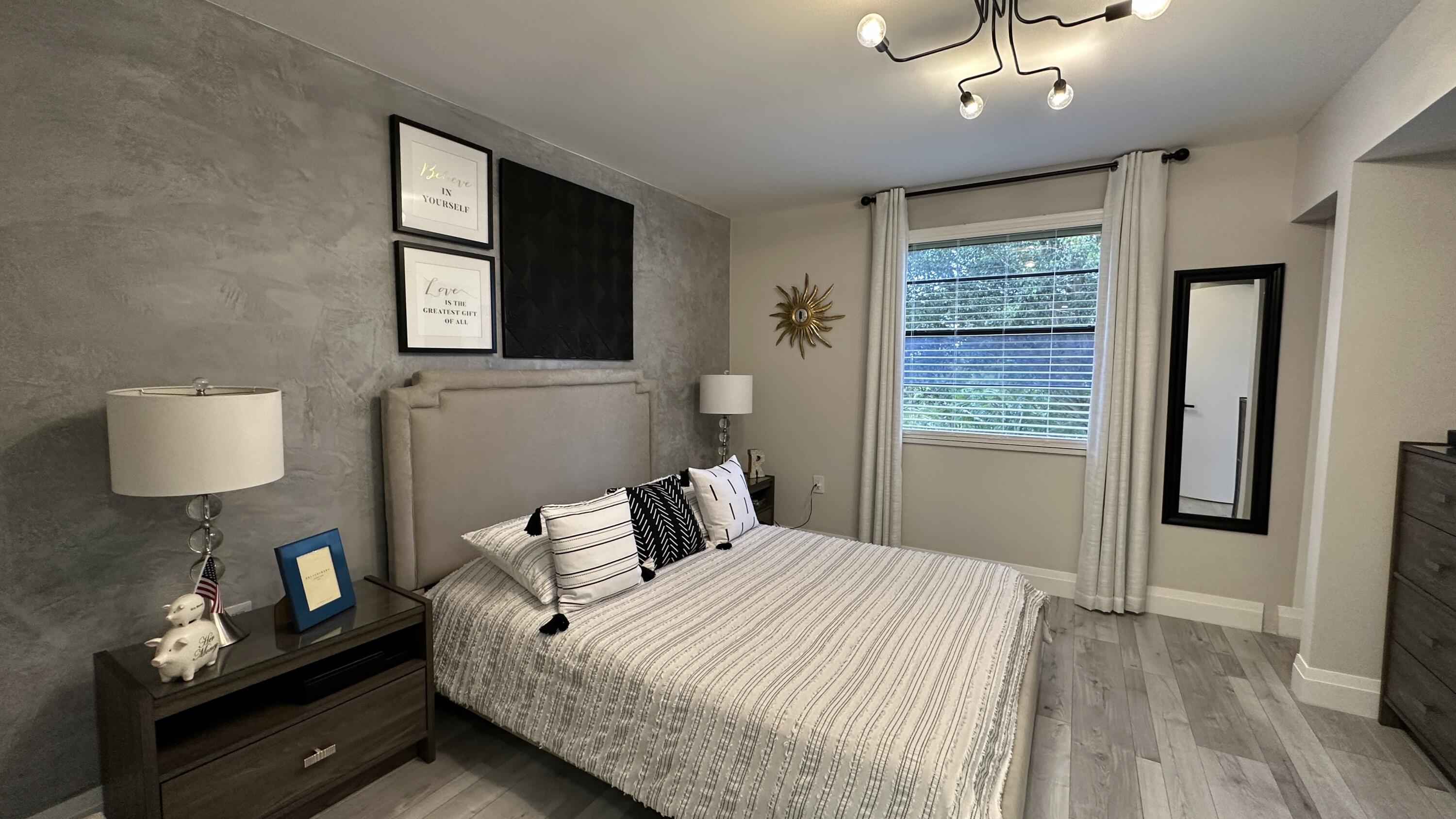 6073 Balboa Circle, Unit 305 Boca Raton, FL 33433 - Photo 15 of 29 a bedroom with bed and window