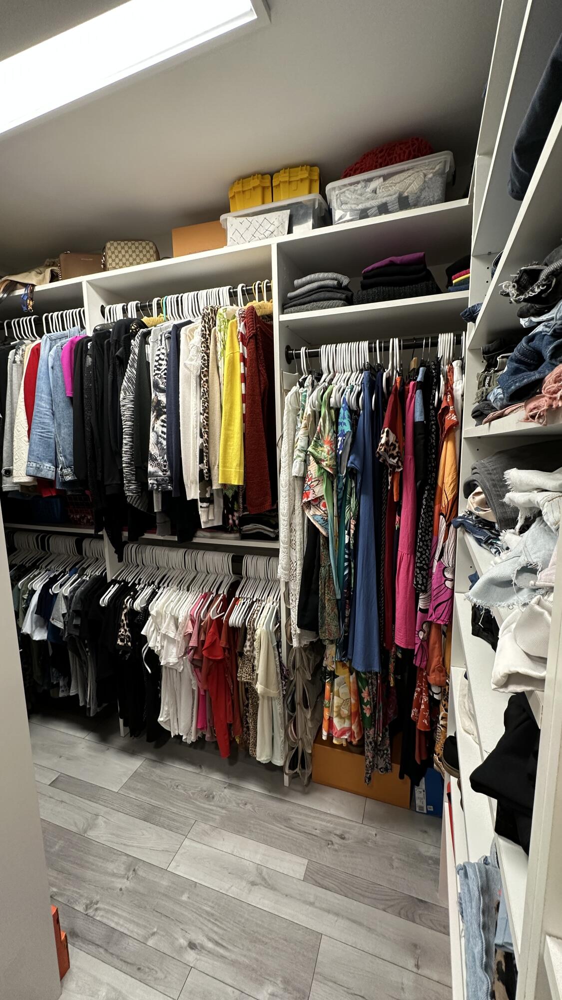 6073 Balboa Circle, Unit 305 Boca Raton, FL 33433 - Photo 20 of 29 a view of walk in closet with clothes and shoes