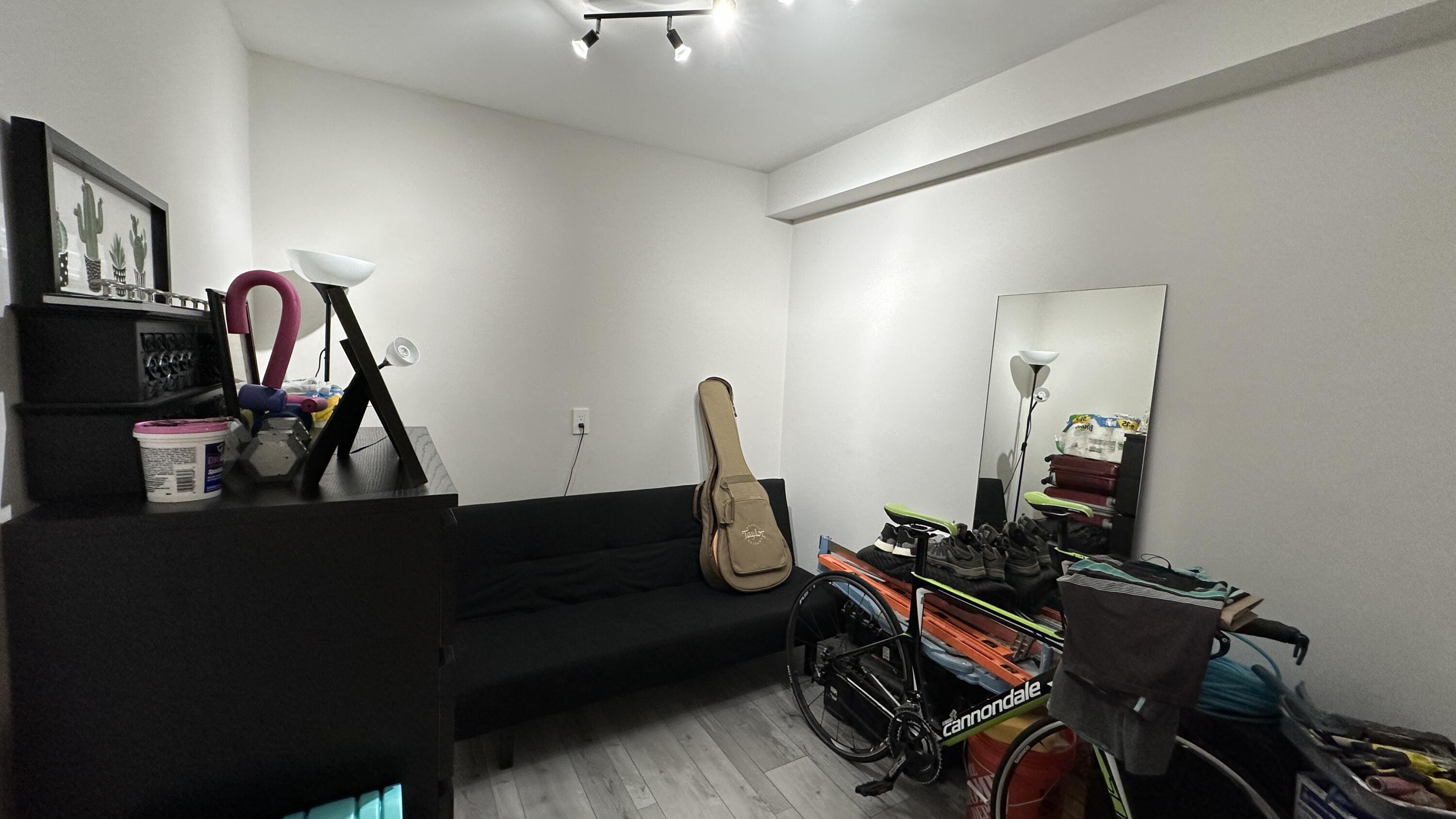 6073 Balboa Circle, Unit 305 Boca Raton, FL 33433 - Photo 21 of 29 a room with gym equipment and wooden floor