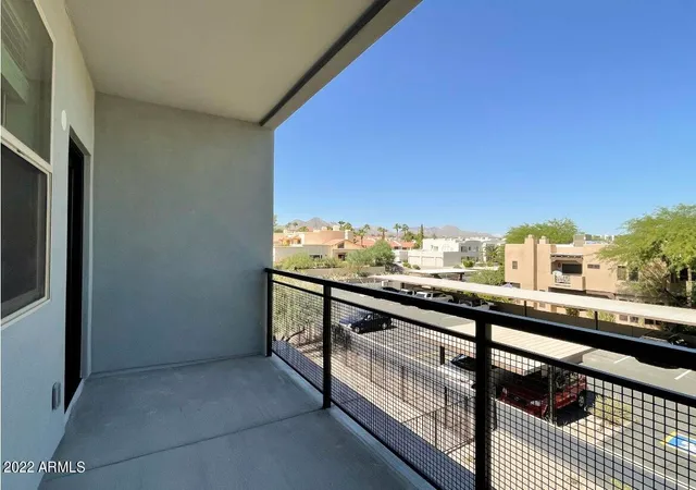 a view of city from a balcony