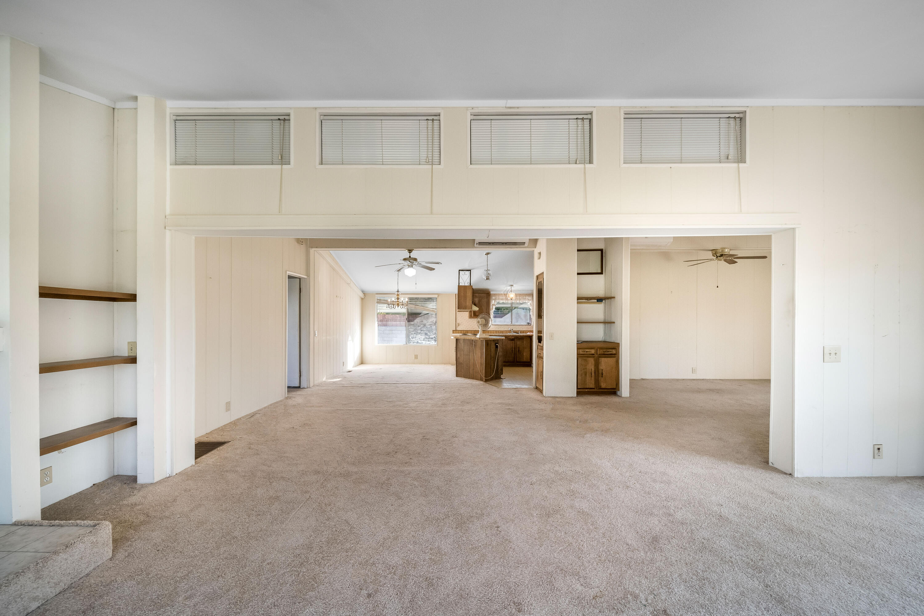 33440 Carlsbad Circle Thousand Palms, CA 92276 - Photo 13 of 52 a view of an empty room with a fireplace