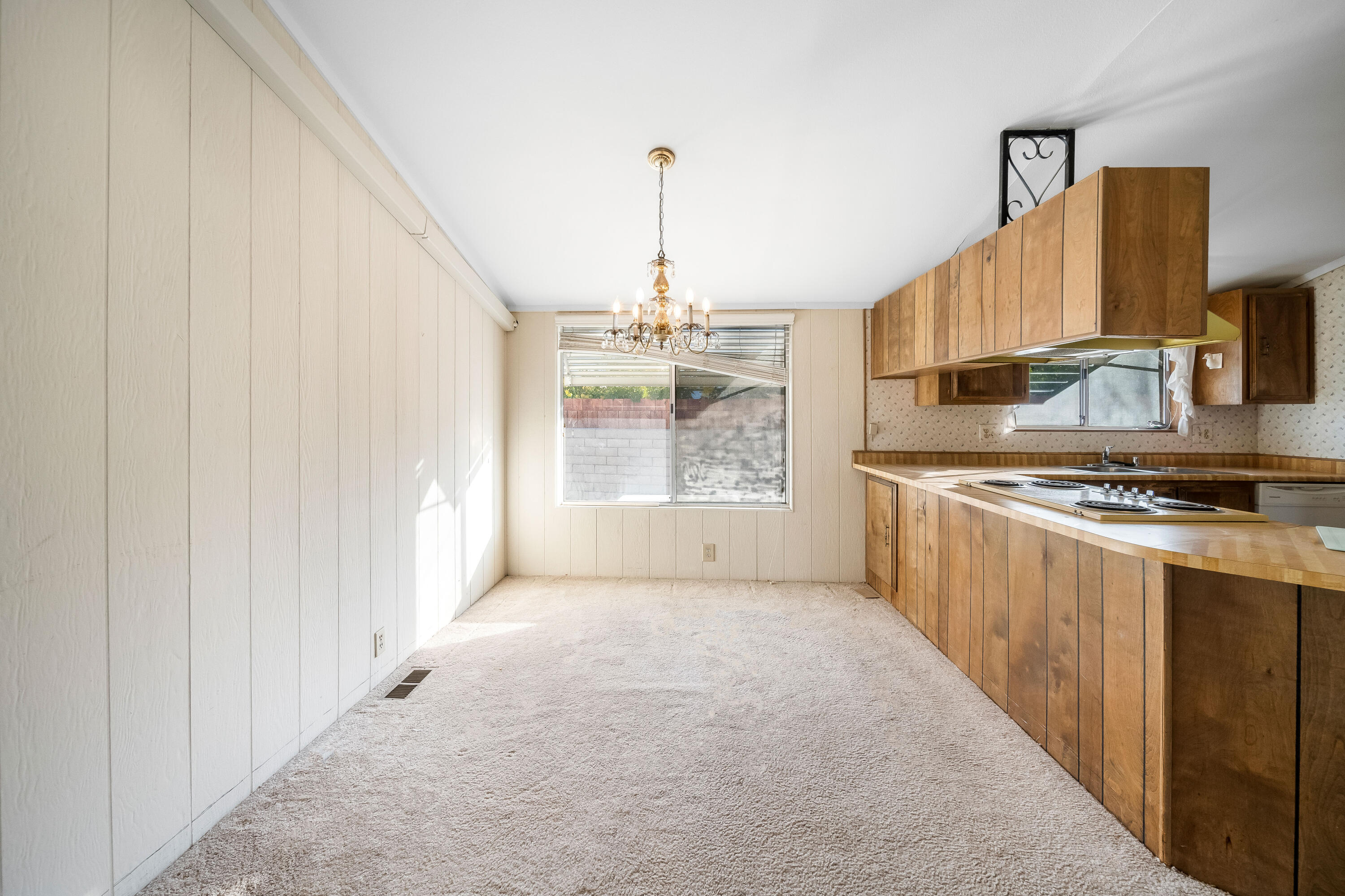 33440 Carlsbad Circle Thousand Palms, CA 92276 - Photo 15 of 52 a kitchen with stainless steel appliances granite countertop a stove and a refrigerator