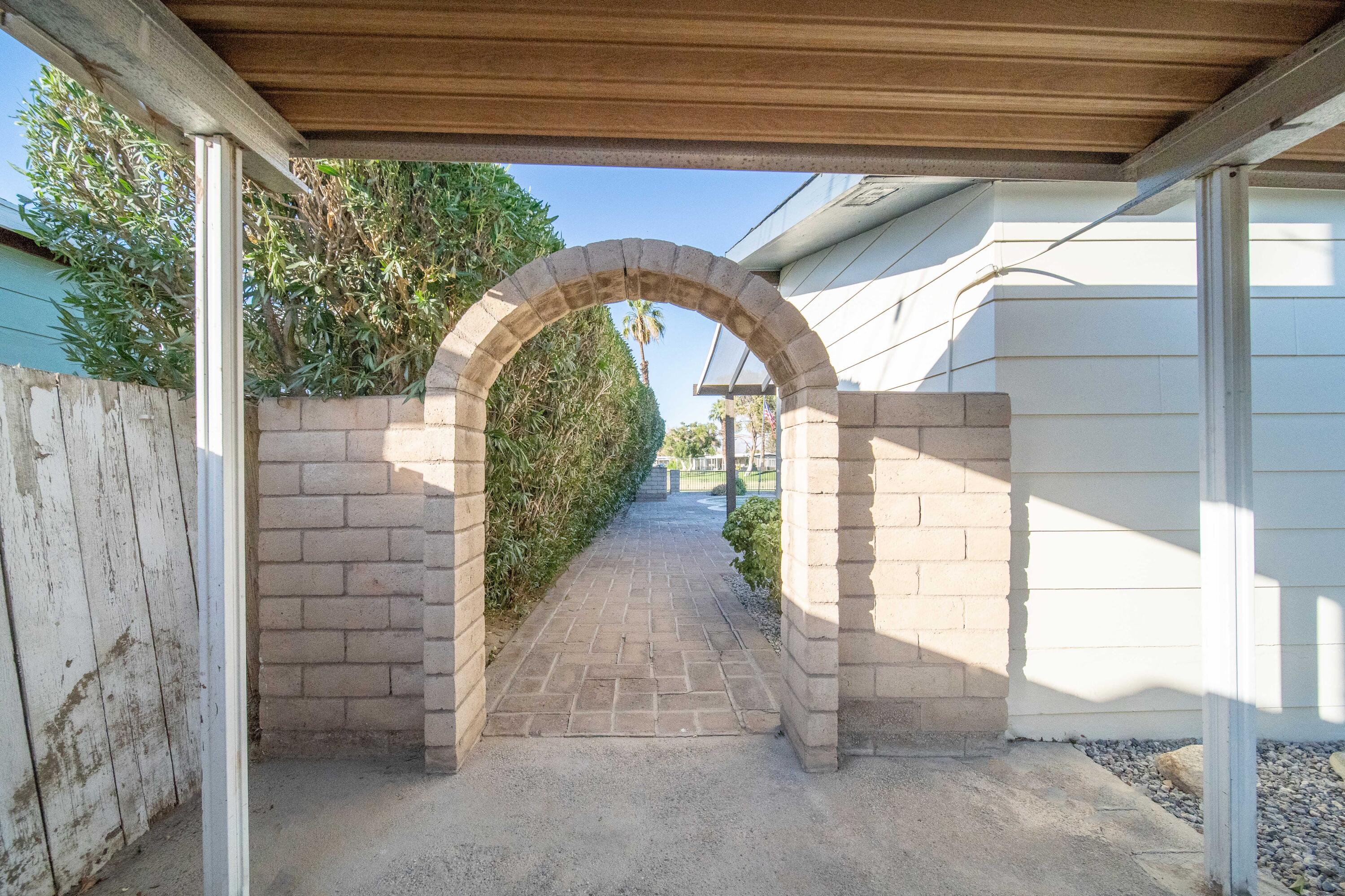 33440 Carlsbad Circle Thousand Palms, CA 92276 - Photo 24 of 52 a view of entryway with garden