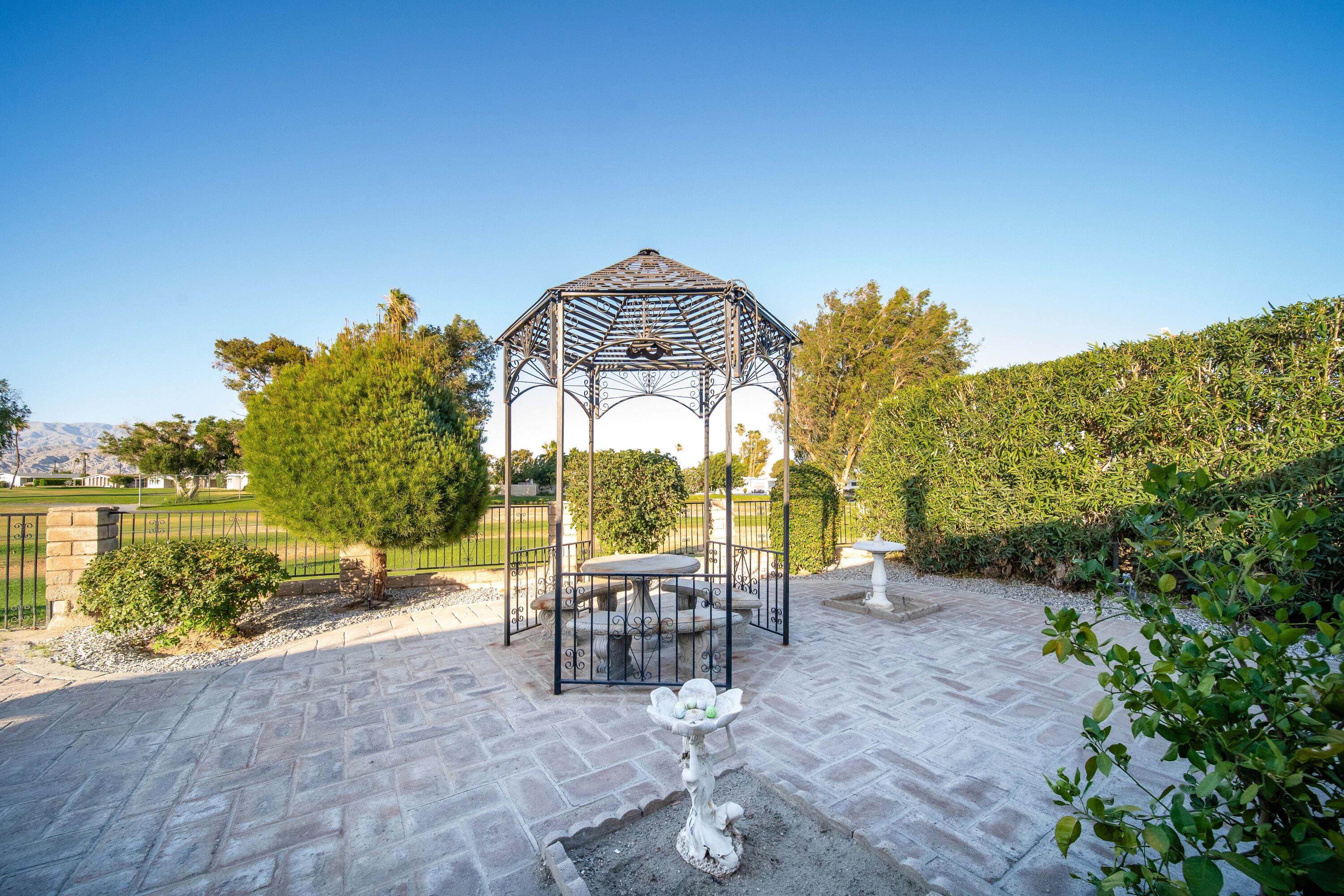 33440 Carlsbad Circle Thousand Palms, CA 92276 - Photo 42 of 52 a view of a chairs and table in patio