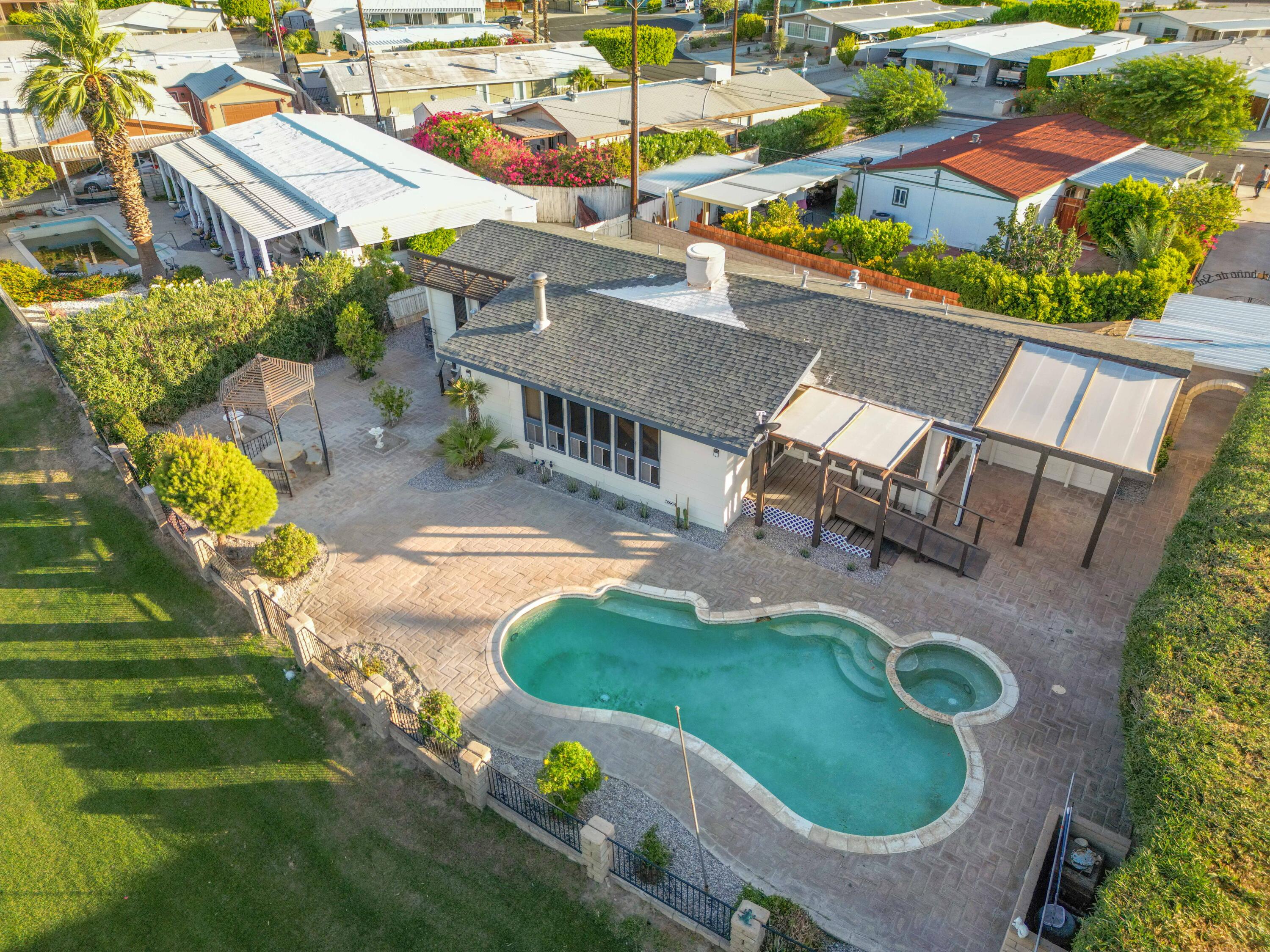 33440 Carlsbad Circle Thousand Palms, CA 92276 - Photo 47 of 52 an aerial view of a house with outdoor space pool patio and outdoor seating