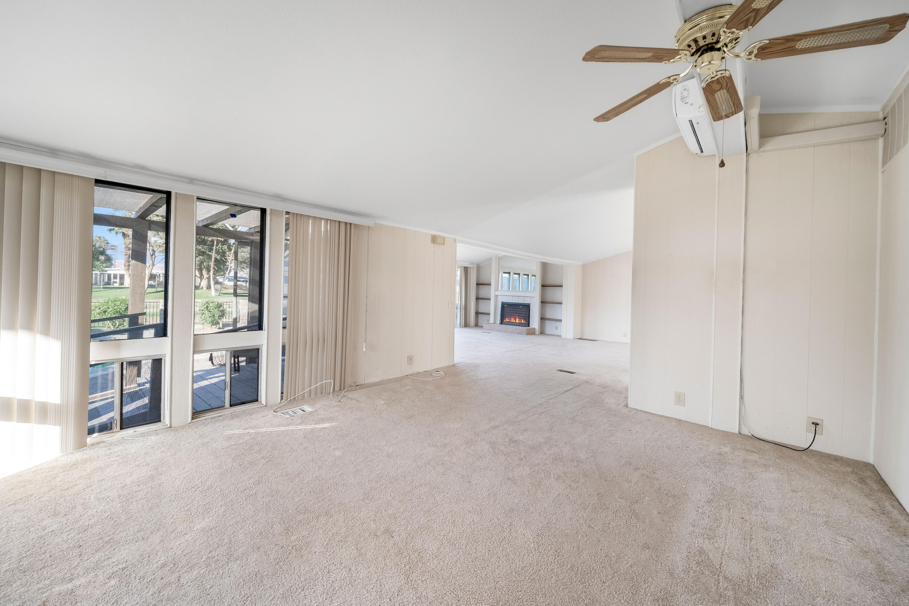 33440 Carlsbad Circle Thousand Palms, CA 92276 - Photo 8 of 52 a view of a big room with closet and windows