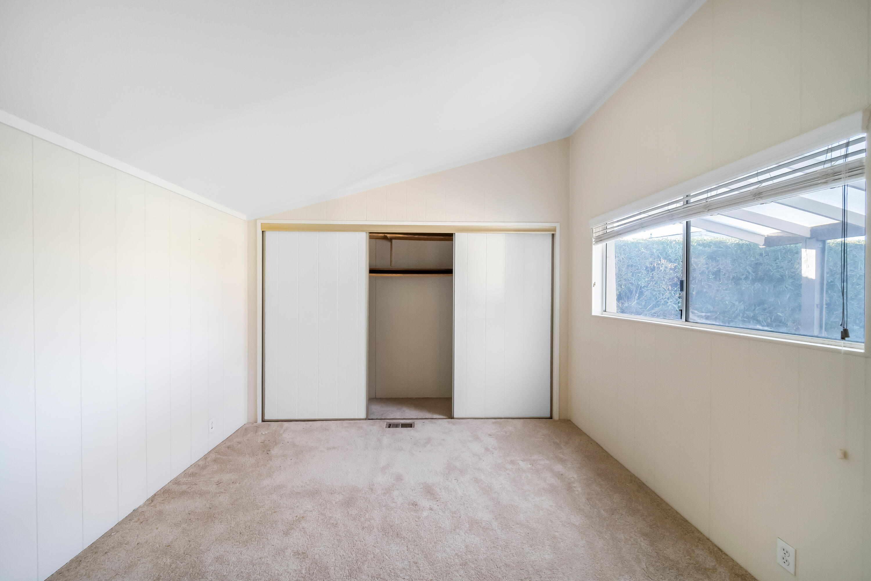 33440 Carlsbad Circle Thousand Palms, CA 92276 - Photo 10 of 52 an empty room with a window