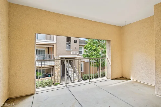 a view of a balcony with an outdoor space