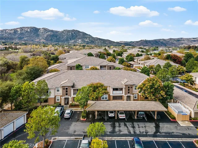 a aerial view of a house with a ocean view