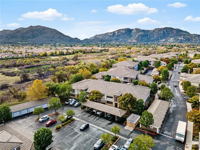 an aerial view of residential houses and outdoor space
