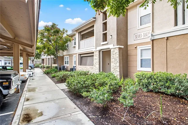 a view of a building with a street