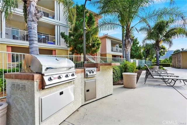 a view of a backyard with fountain and fountain