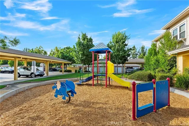 a view of a park with furniture