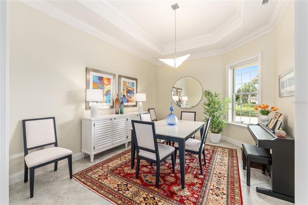 8671 Southwest 83rd Loop Ocala, FL 34481 - Photo 11 of 58 a view of a dining room with furniture window and outside view