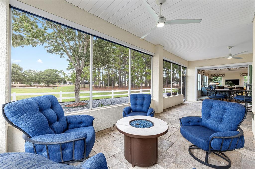8671 Southwest 83rd Loop Ocala, FL 34481 - Photo 31 of 58 a living room with furniture and a large window