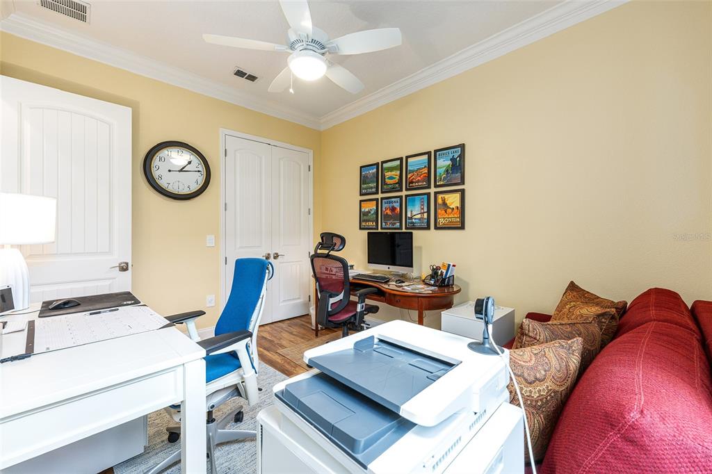 8671 Southwest 83rd Loop Ocala, FL 34481 - Photo 45 of 58 a living room with furniture and a window