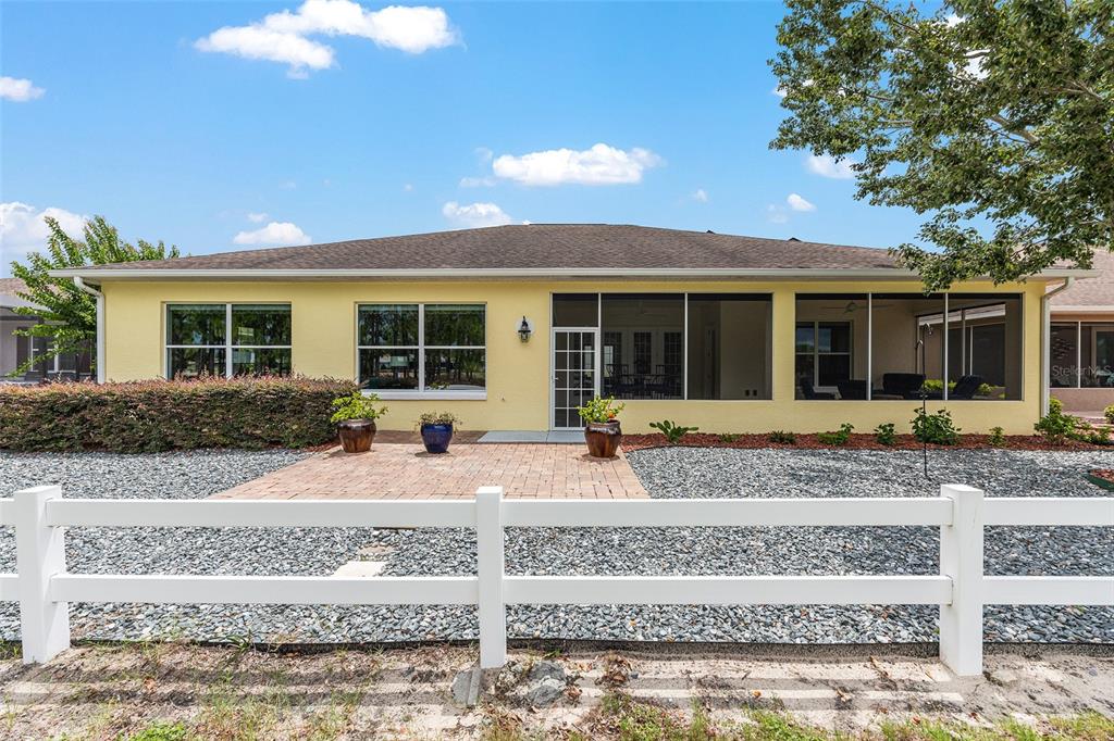8671 Southwest 83rd Loop Ocala, FL 34481 - Photo 51 of 58 front view of house with a yard
