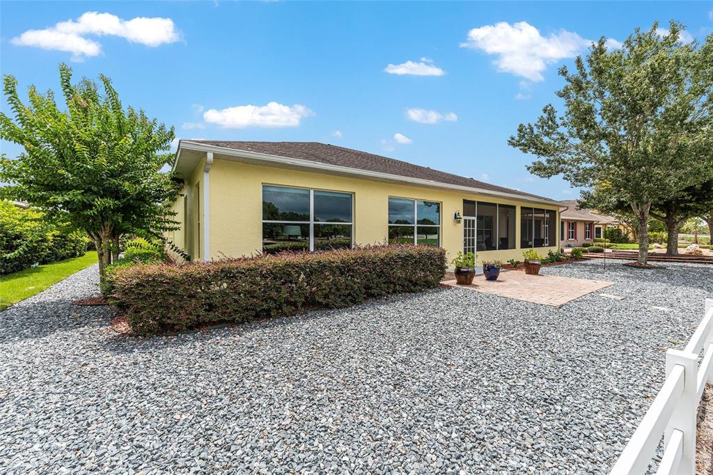 8671 Southwest 83rd Loop Ocala, FL 34481 - Photo 52 of 58 a view of a house with a patio