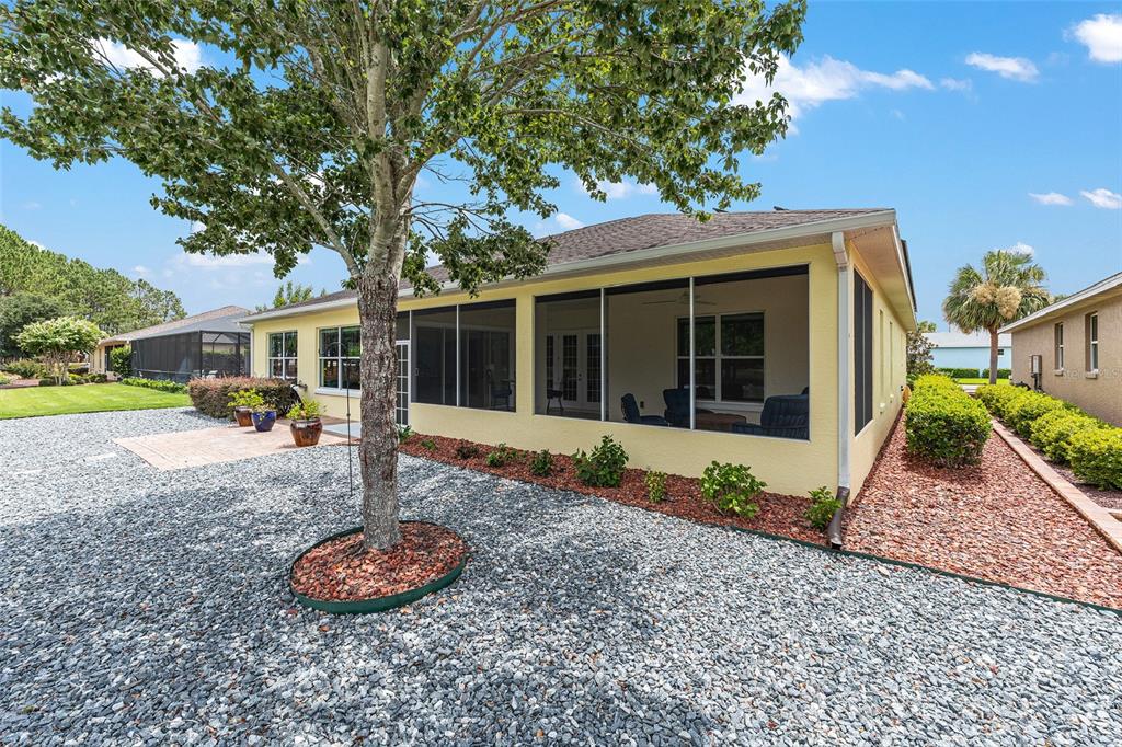 8671 Southwest 83rd Loop Ocala, FL 34481 - Photo 58 of 58 a front view of a house with a yard