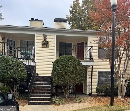 front view of a house with a small yard