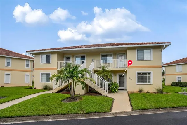 a front view of house with yard