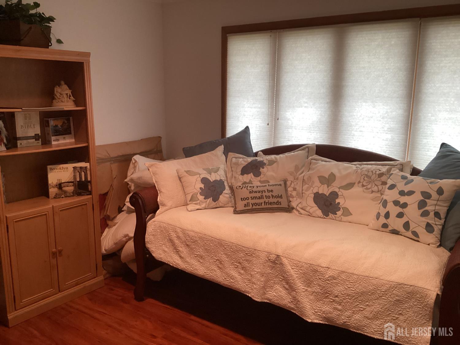 41 Faith Lane Matawan, NJ 07747 - Photo 22 of 24 a bedroom with a bed and window