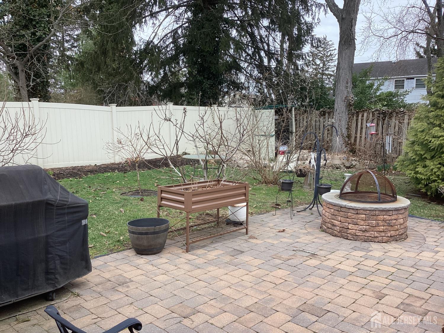 41 Faith Lane Matawan, NJ 07747 - Photo 7 of 24 a garden view with a seating space