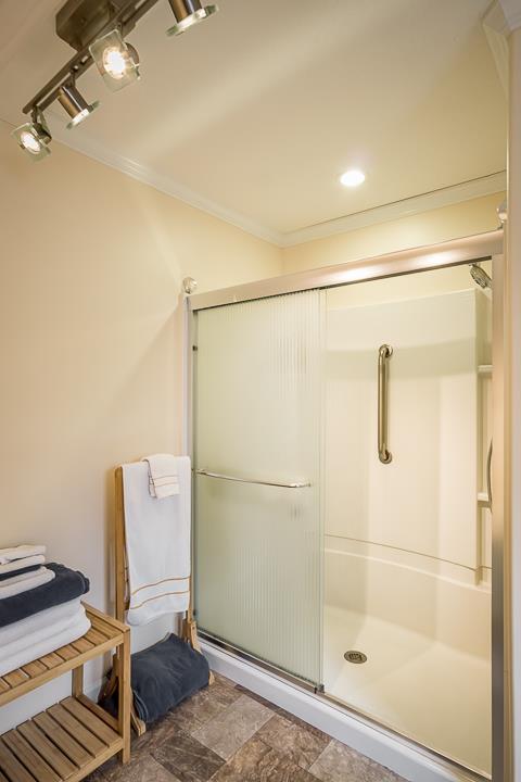 2329 Roslin Road Jamestown, TN 38556 - Photo 19 of 30 a bathroom with a shower and a sink