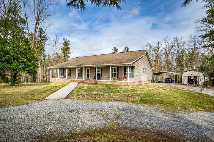 2329 Roslin Road Jamestown, TN 38556 - Photo 24 of 30 a view of a house with a yard