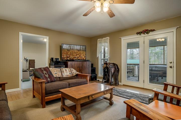2329 Roslin Road Jamestown, TN 38556 - Photo 6 of 30 a living room with furniture and a fireplace