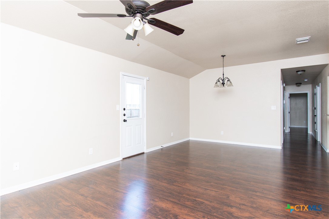 1102 Grace Point Drive, Unit A Killeen, TX 76549 - Photo 2 of 18 a view of an empty room with wooden floor