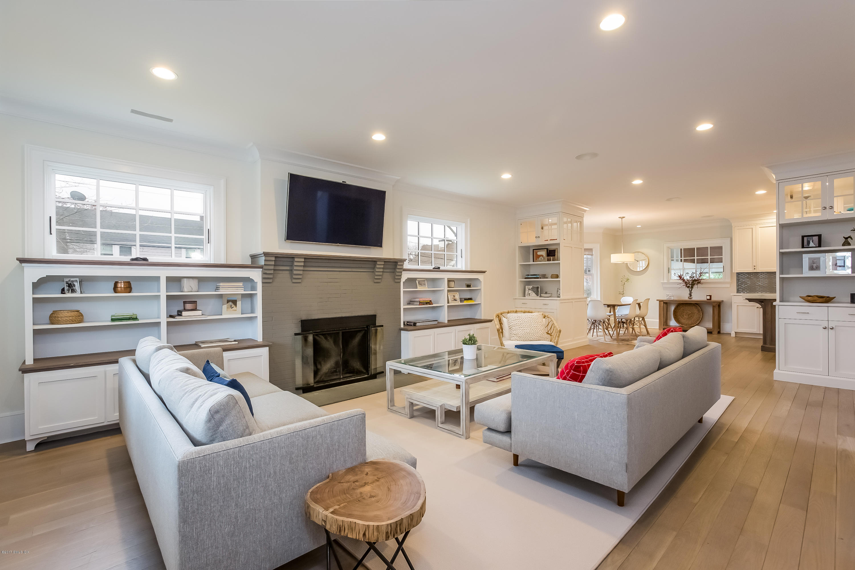 39 Edgewater Drive Old Greenwich, CT 06870 - Photo 2 of 19 a living room with furniture fireplace and flat screen tv