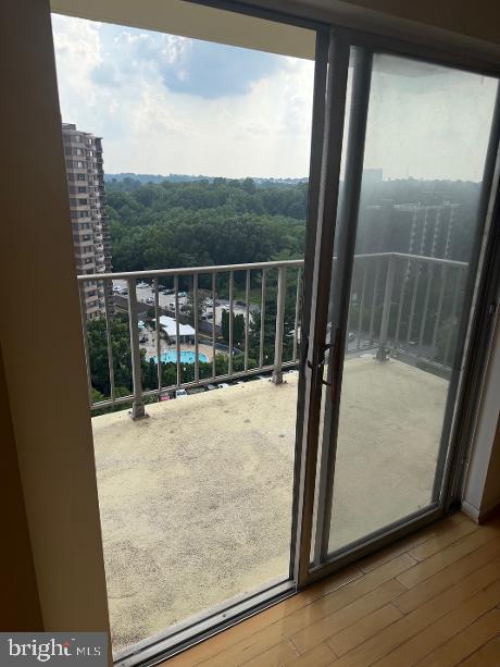 1121 University Boulevard West, Unit 1312 Silver Spring, MD 20902 - Photo 7 of 17 Scenic balcony with city views.