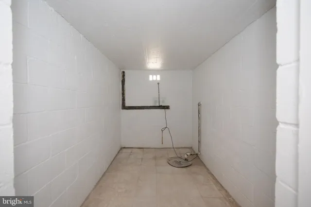 a view of a room with an empty space