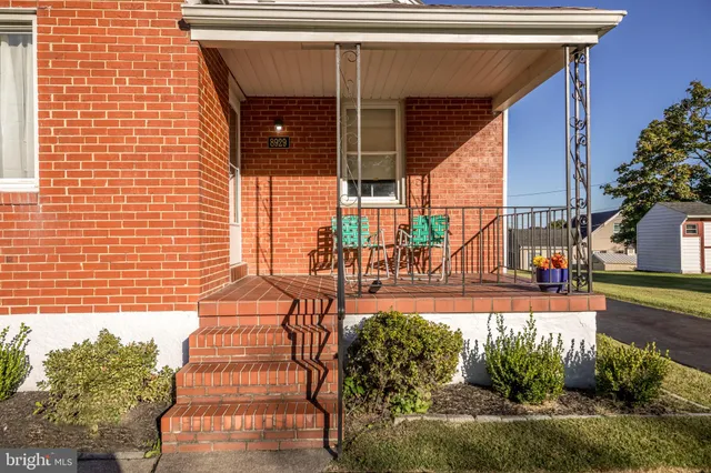 a view of swimming pool with outdoor seating