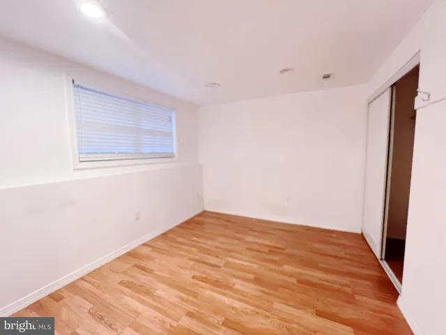 a view of a hallway with stairs