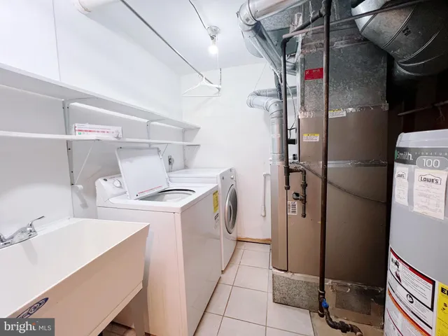 a view of backyard with a table and chairs