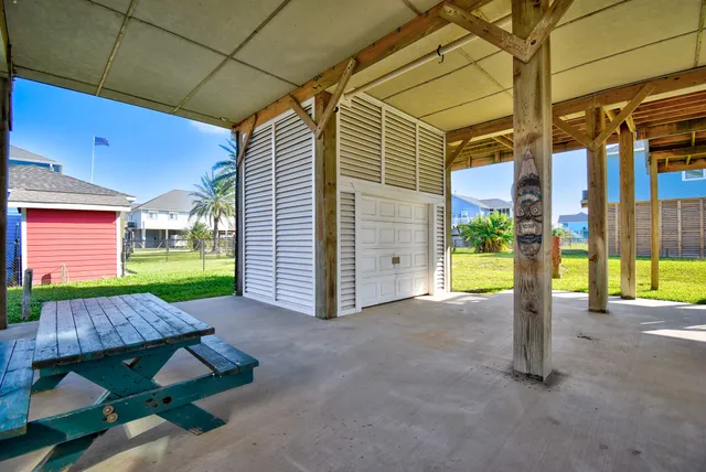 a view of a backyard with a tub