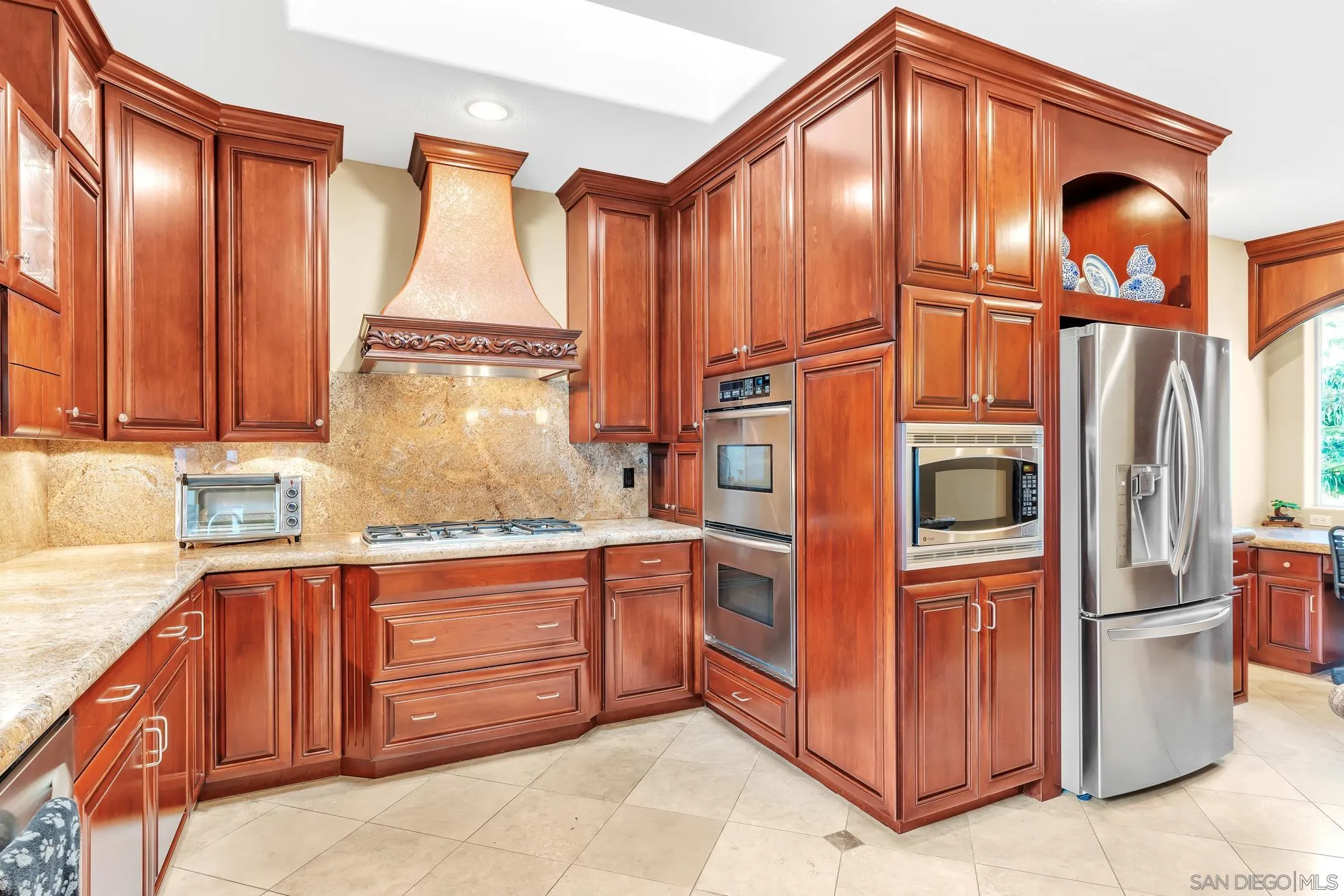 2389 Victoria Circle Alpine, CA 91901 - Photo 12 of 75 a kitchen with stainless steel appliances granite countertop a refrigerator and a stove top oven