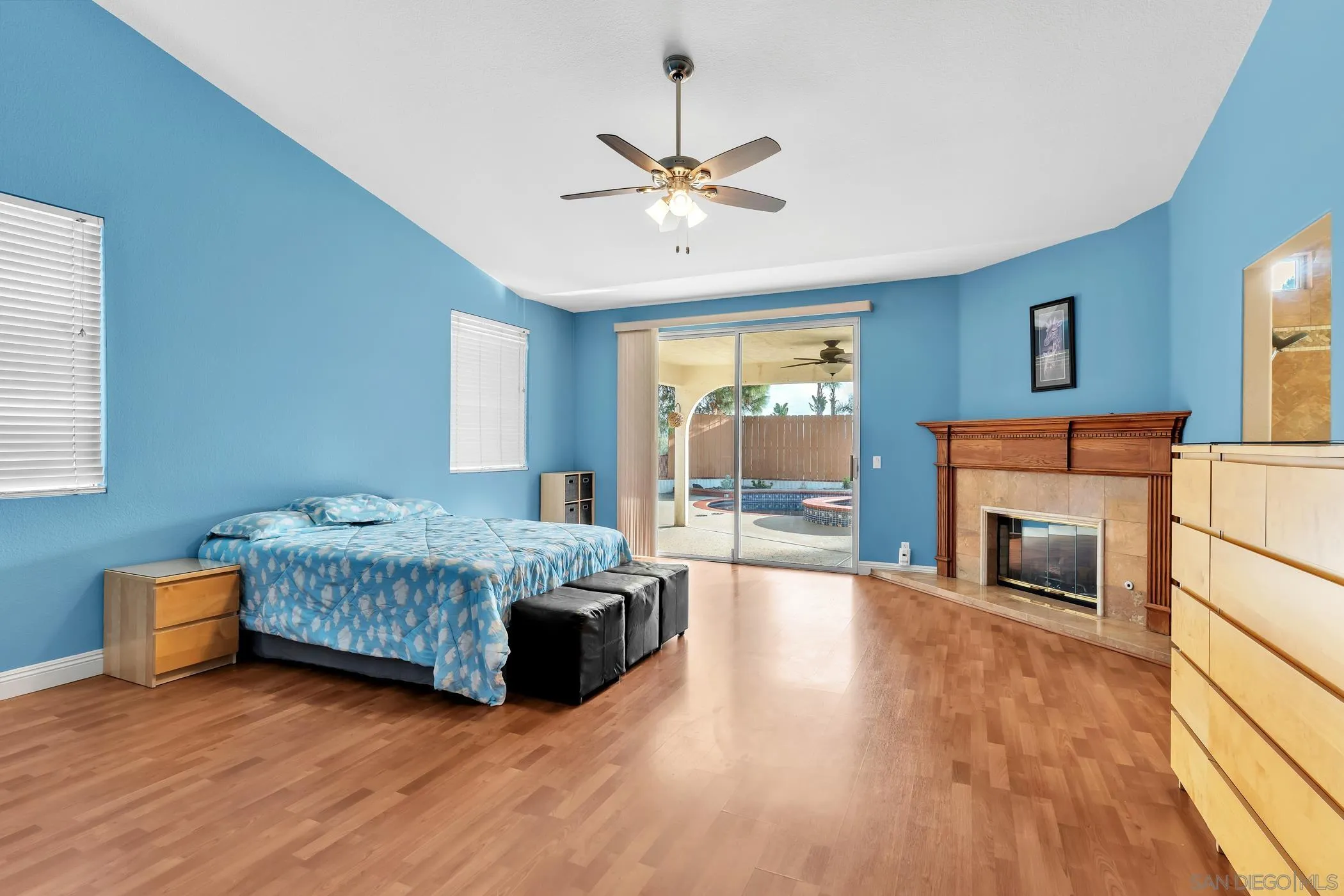 2389 Victoria Circle Alpine, CA 91901 - Photo 20 of 75 a living room with furniture and a fireplace