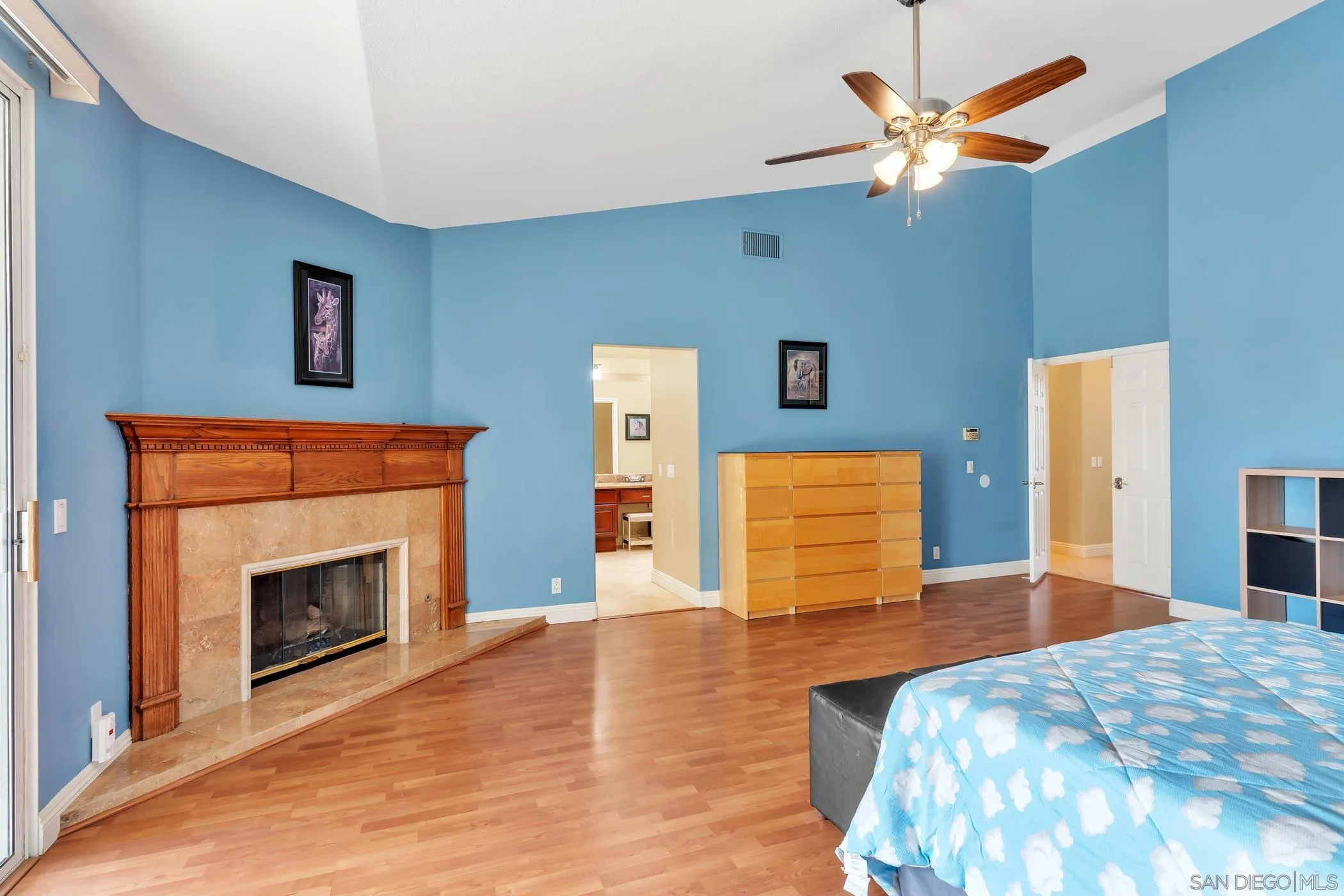 2389 Victoria Circle Alpine, CA 91901 - Photo 22 of 75 a bedroom with a bed and a fireplace