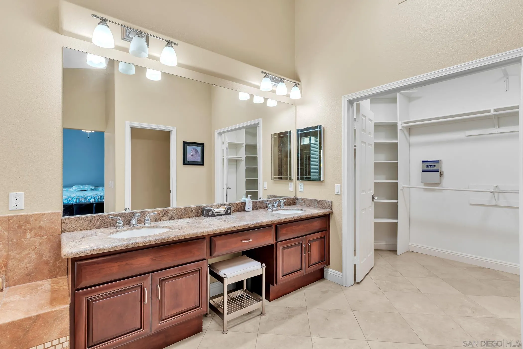 2389 Victoria Circle Alpine, CA 91901 - Photo 26 of 75 a bathroom with a sink double vanity and a shower