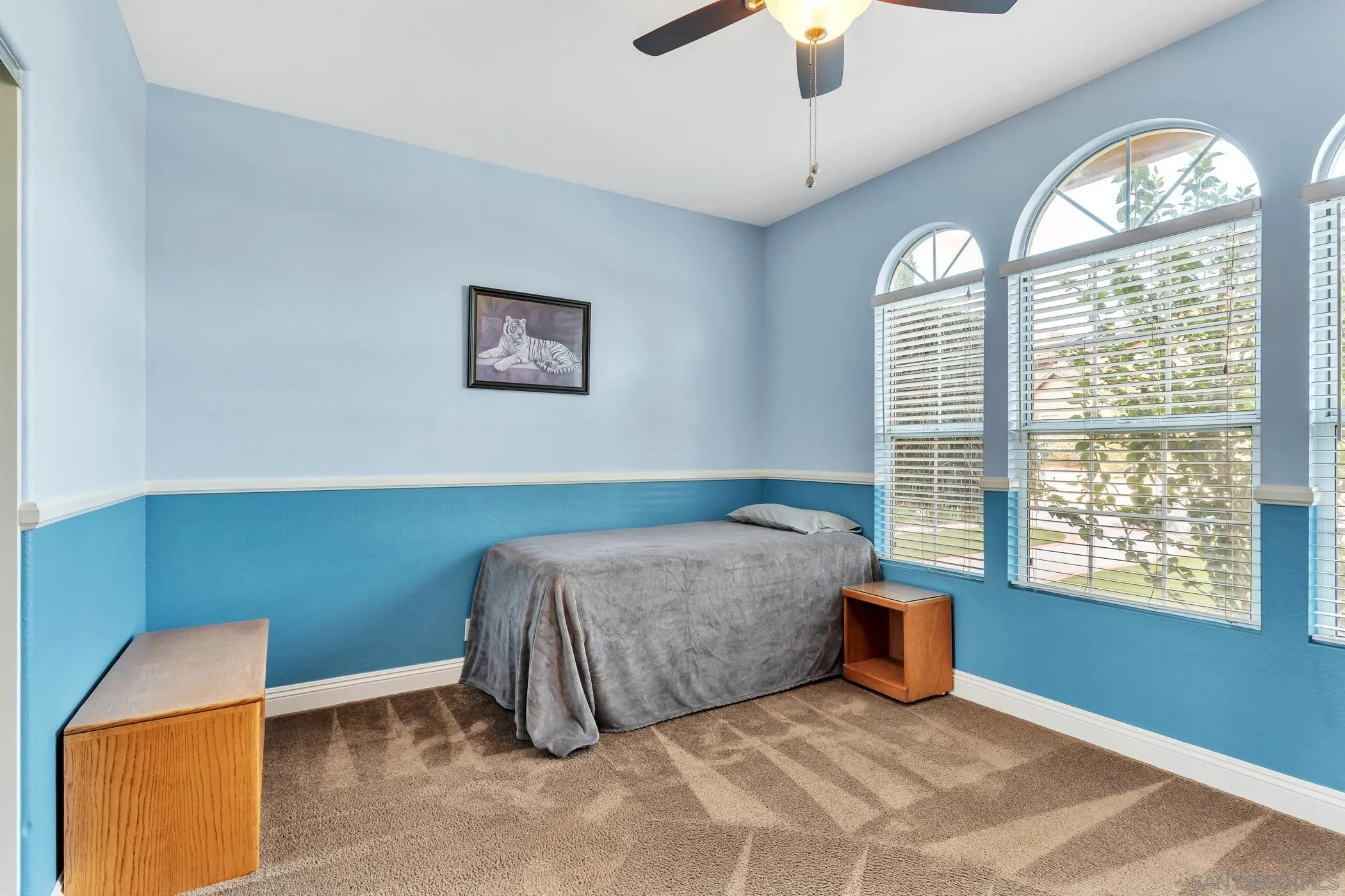 2389 Victoria Circle Alpine, CA 91901 - Photo 32 of 75 a living room with a bed and a window