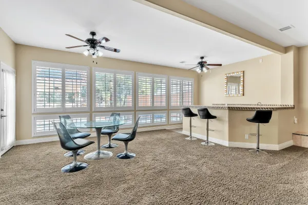 a bathroom with a sink a mirror and shower