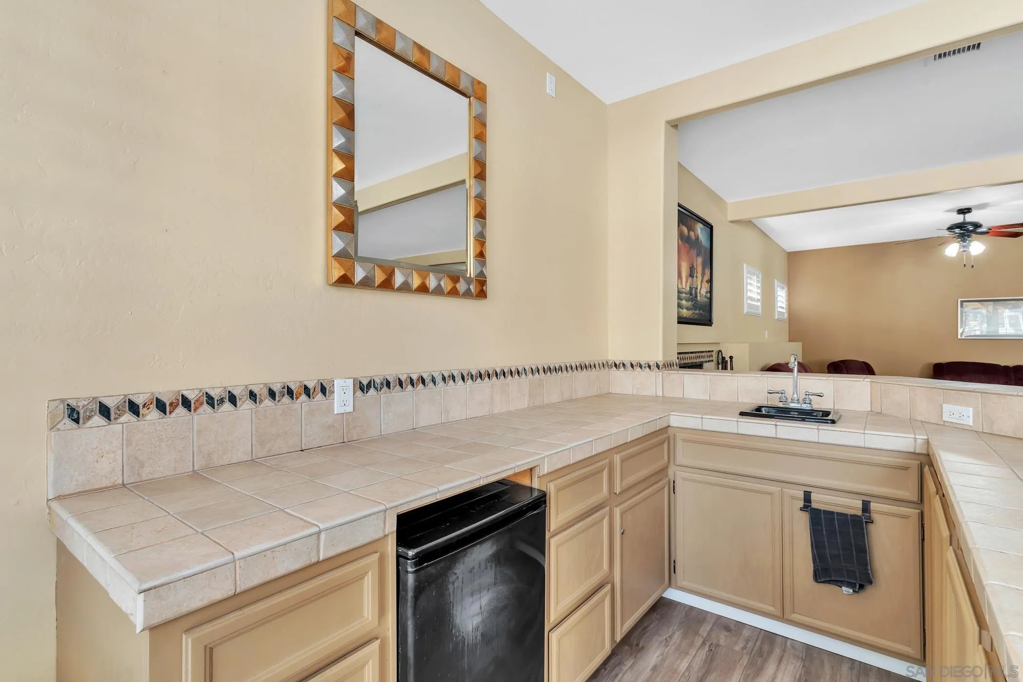 2389 Victoria Circle Alpine, CA 91901 - Photo 42 of 75 a kitchen that has a sink and a stove in it