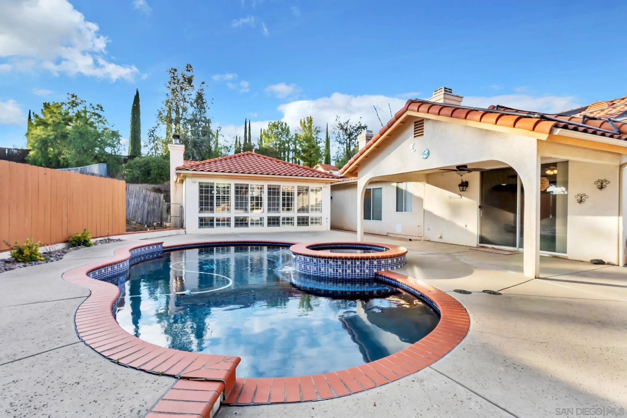 2389 Victoria Circle Alpine, CA 91901 - Photo 48 of 75 a front view of a house with swimming pool