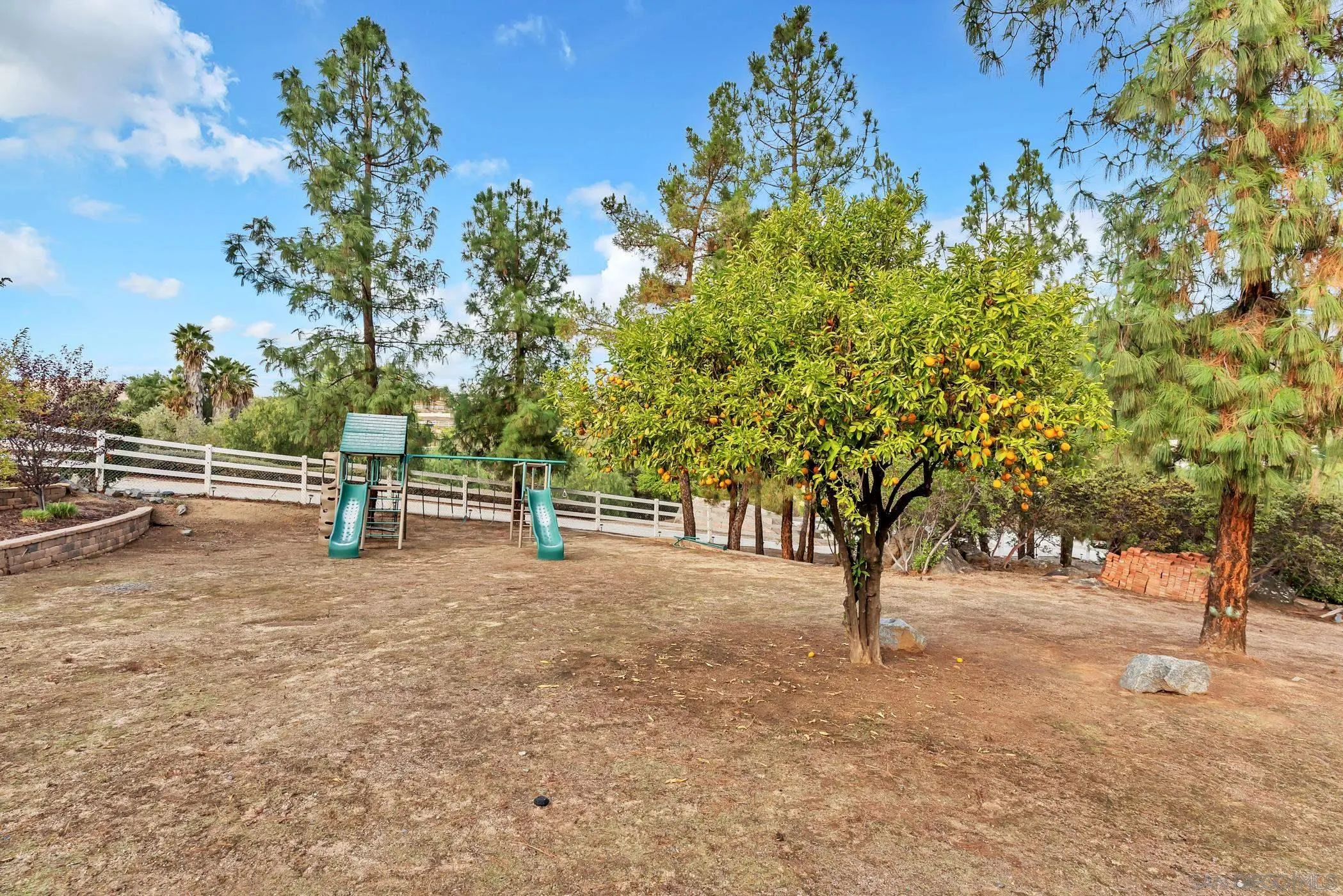 2389 Victoria Circle Alpine, CA 91901 - Photo 55 of 75 a view of outdoor space with deck and tree